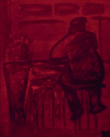 L'artiste Robert Soret - homme assis bar bordeau fonce