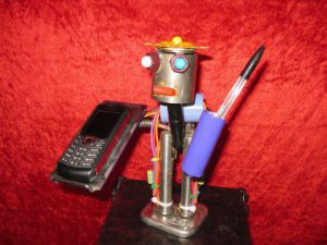 Voir le détail de cette oeuvre:  support  robot  acier    pour  portable et stylo  